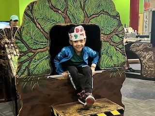 a child smiling at the museum