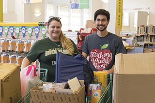 Students donating school supplies