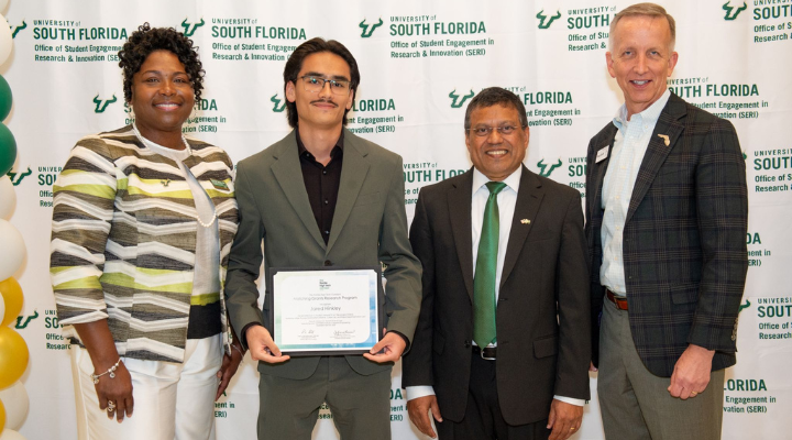 Intern holding award