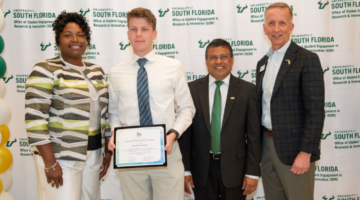 Intern holding award