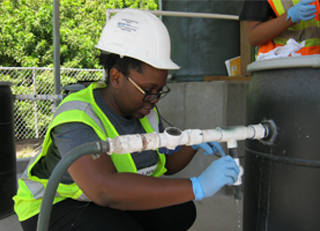 CEE students and faculty work on a project at a test wastewater facility