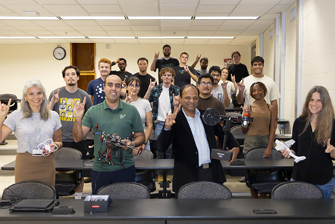 Students and faculty in an aerospace engineering course