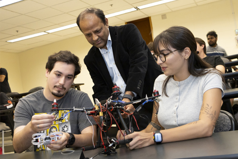 Aerospace engineering students learning in classroom