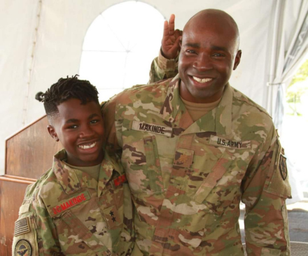 Omololu with his son
