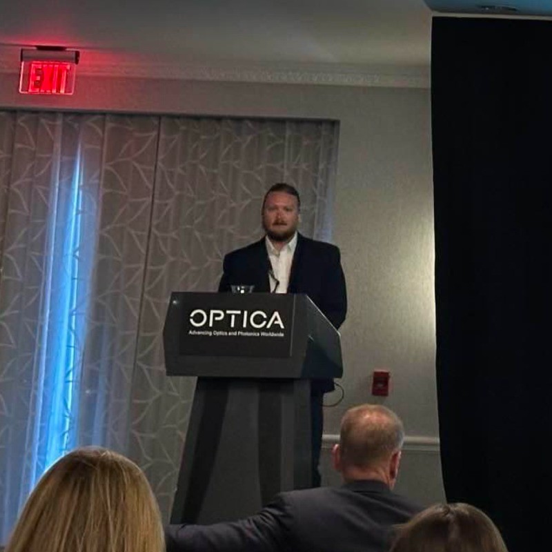 Sean speaking at a conference