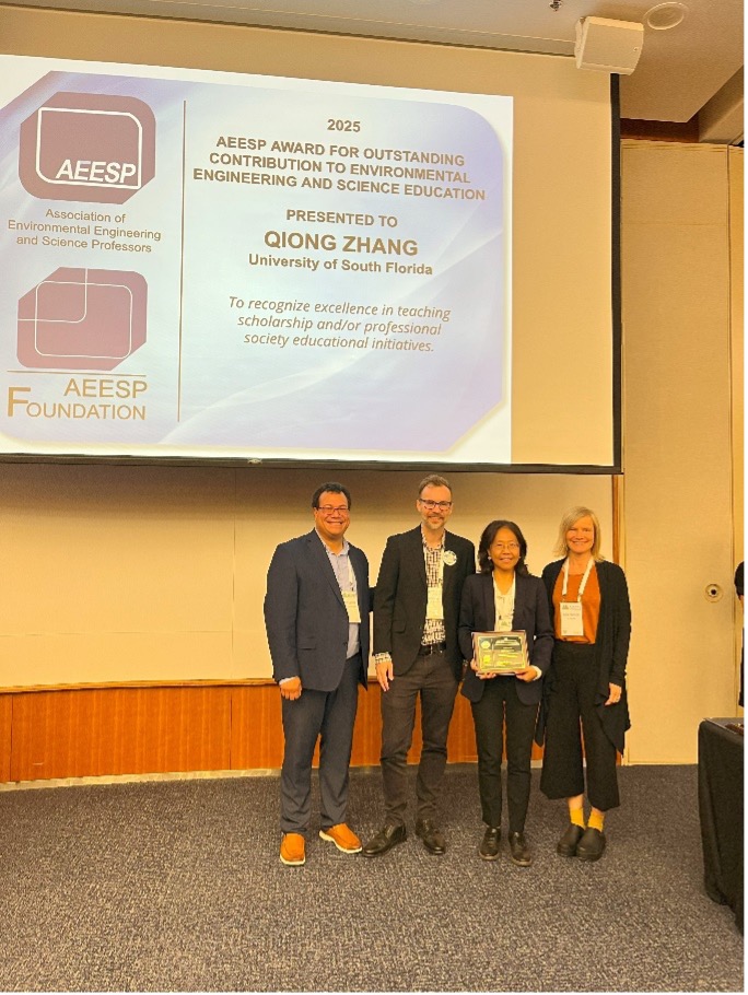 Professor Zhang (second from right) receiving her AEESP Outstanding Contribution to Environmental Engineering & Science Education award at the 2025 AEESP Education and Research Conference.