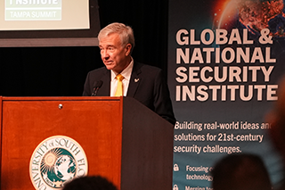 Retired Marine Corps General, Frank McKenzie, speaking at GNSI event