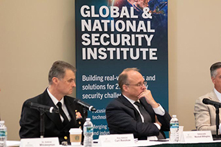 Photo of panel discussion at GPC6
