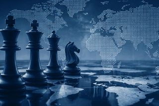 artist's rendering of chess pieces on chess board in front of a global map