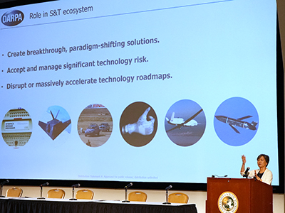 Dr. Stefanie Tompkins explaining DARPA's role in the S&T Industry