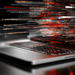 Artists rendering of digital information flowing outward from the screen of a laptop