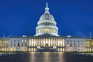 Nighttime view of the U.S. Capitol Building in Washington, DC