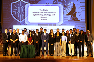 Group of students from the GNSI Future Strategist Program, on stage celebrating their first hosted conference in 2025