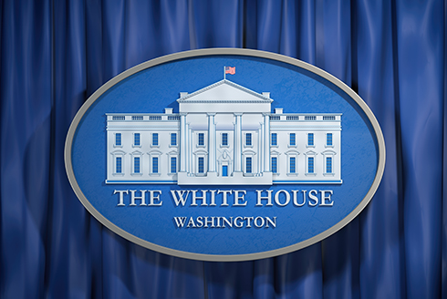 White House logo on press room curtain