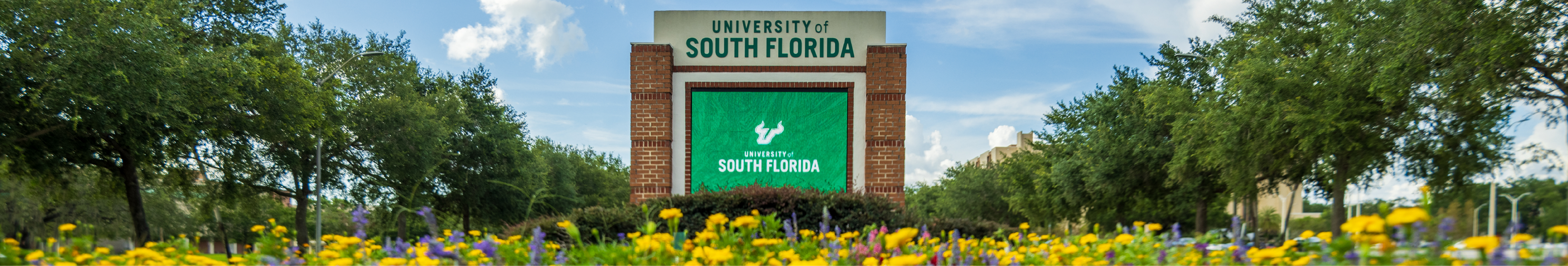 USF Sign with flowers as page cover photo