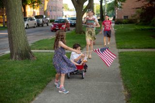 Family at a Fourth of July parade