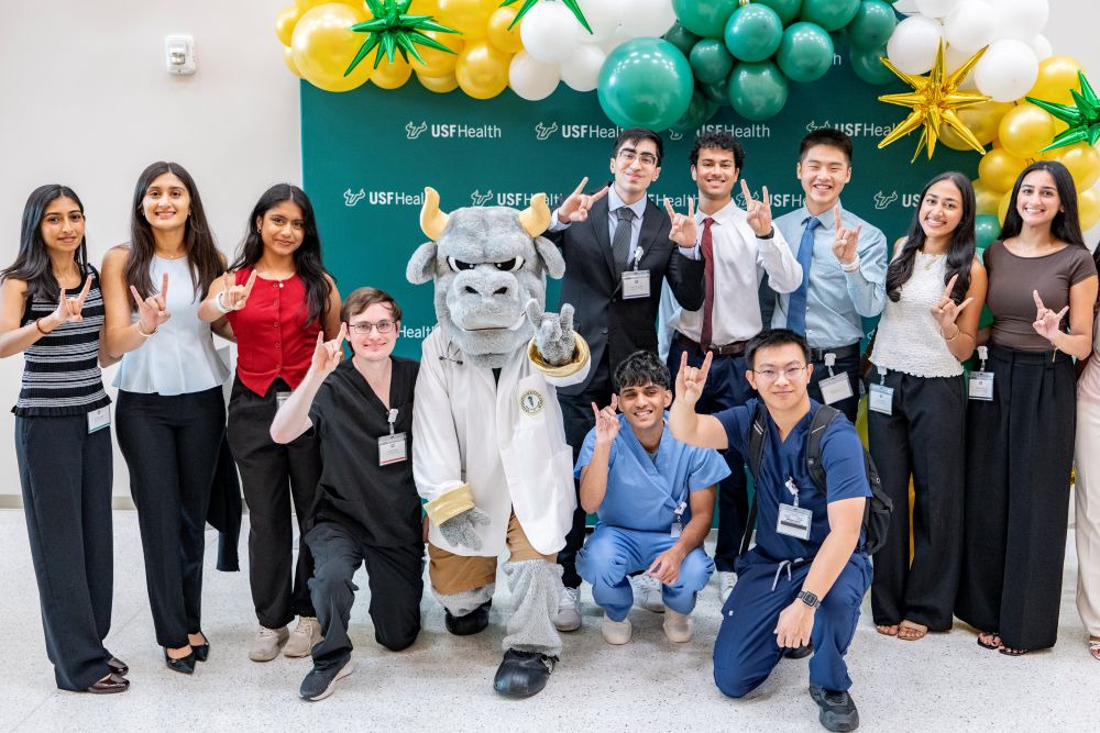 New MCOM medical students with USF's Rocky D. Bull. 
