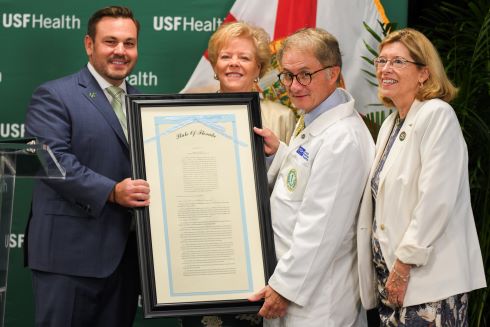Florida Rep. Adam Anderson presented USF with an original copy of the Sunshine Genetics Act Friday. 