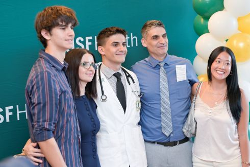 MCOM students after the 2026 White Coat Ceremony.
