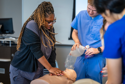 Students participating in basic life support training.