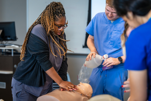 Students participating in basic life support training. 