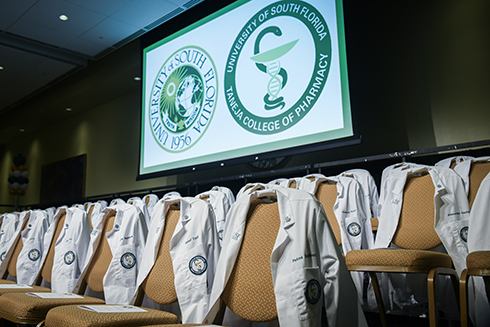 White coats on chairs