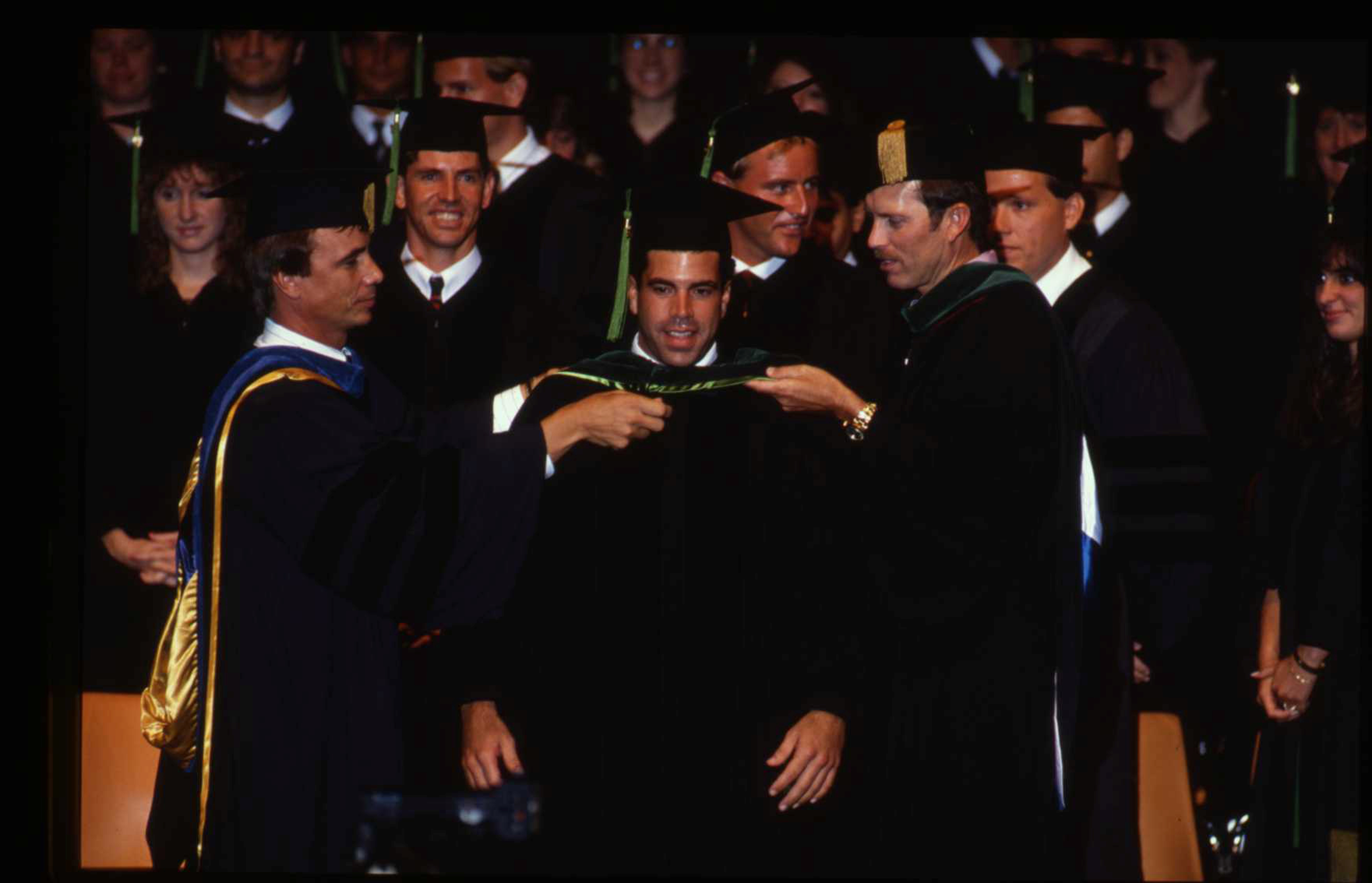 An MCOM graduate gets his academic hood.