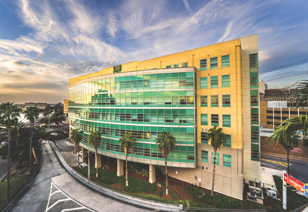 The USF Health South Tampa Center for Advanced Healthcare facility at sunset