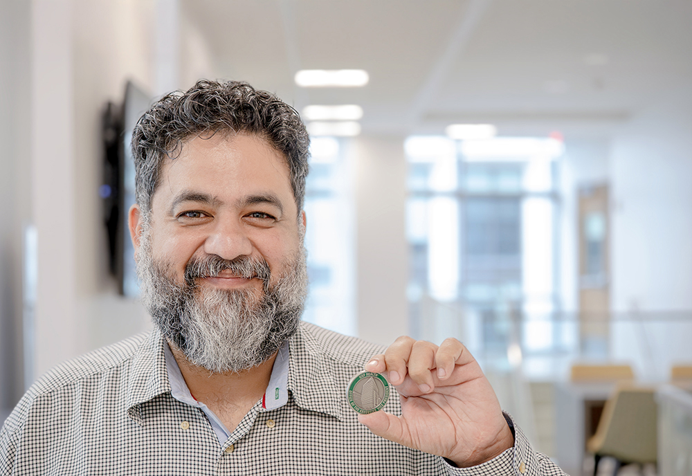 Jesse Casanova receives USF Health Culture Coin for Japan delegation leadership
