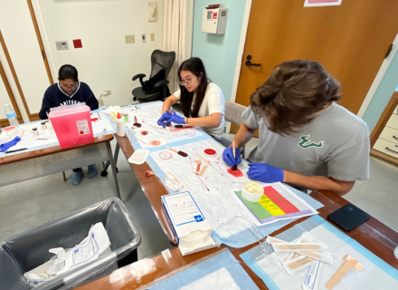 USF undergraduate students participate in a hands-on medical skills lab at CAMLS