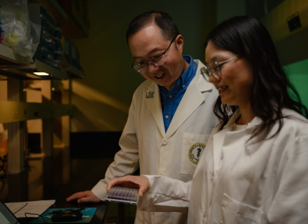 Dr. Yong Xu and a lab member