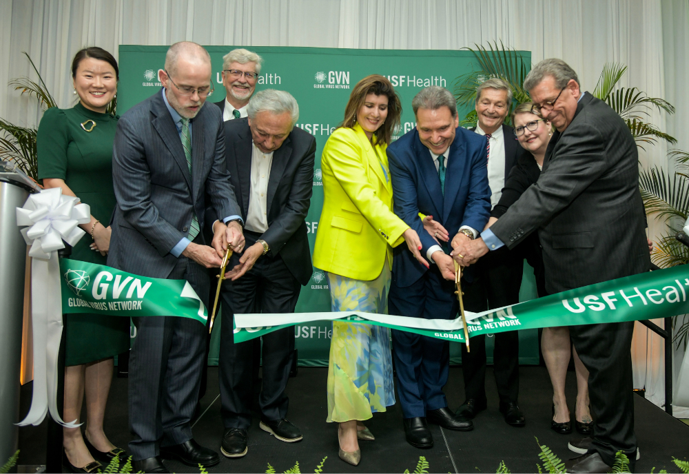 Leaders of USF and the Global Virus Network cutting the ceremonial ribbon for the new international headquarters