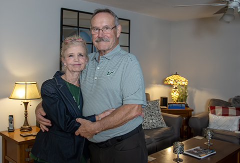 Karin and Bob Johnson in their living room. 