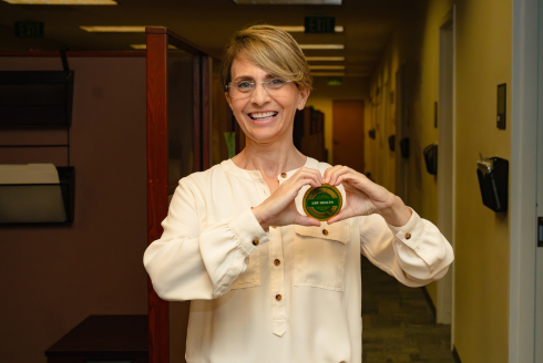 Jennifer Newcomb earns USF Health Culture Coin for strengthening connections across Internal Medicine