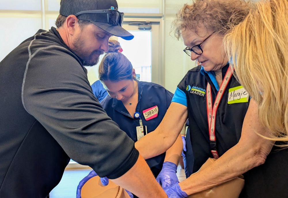 USF health expert training local providers on a simulation mannequin 