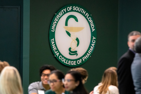 The seal of the USF Health Taneja College of Pharmacy