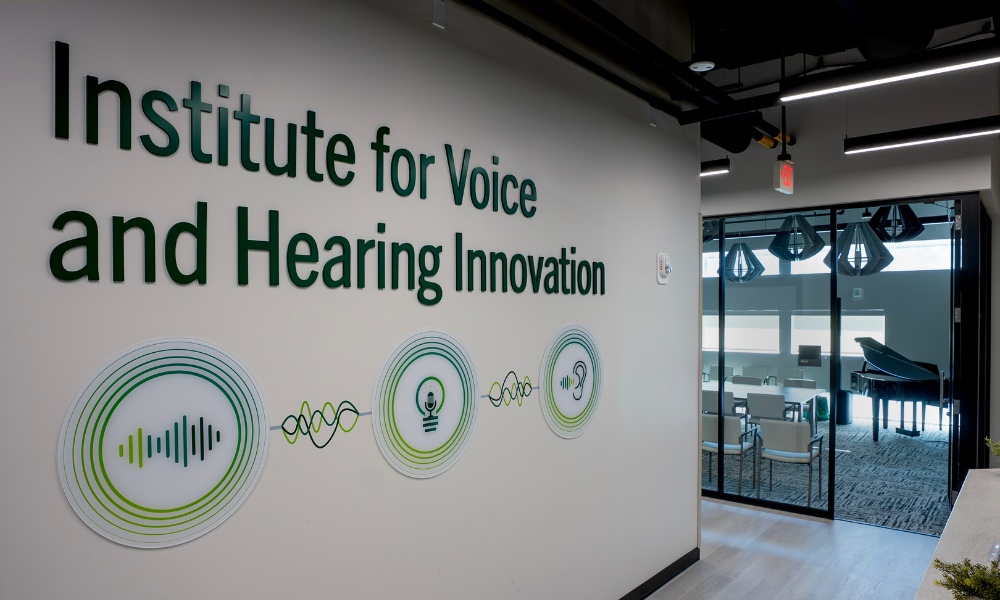 Sign reading "Institute for Voice and Hearing Innovation"