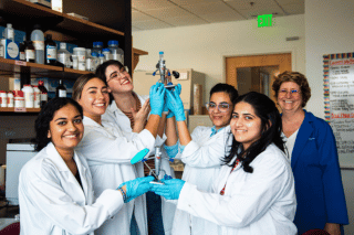 Lab volunteers take fun group photo