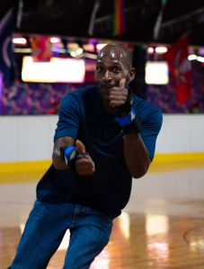 Jason Hepburn shows off his skating skills at Retro Skate Party