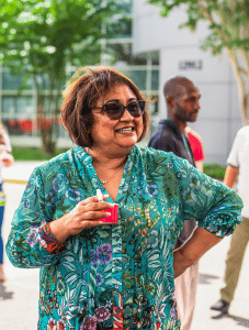 Dean Usha Menon smiling at the BBQ