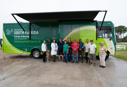 Duellyn Pandis (third from left) with Vicki Pope (left), Alex Delima (third from right) and other folks from TBD