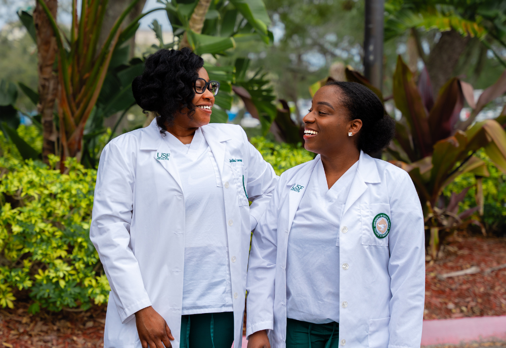 BSNA student leaders Alexandria Burton and Jurdina Lamour pose together.