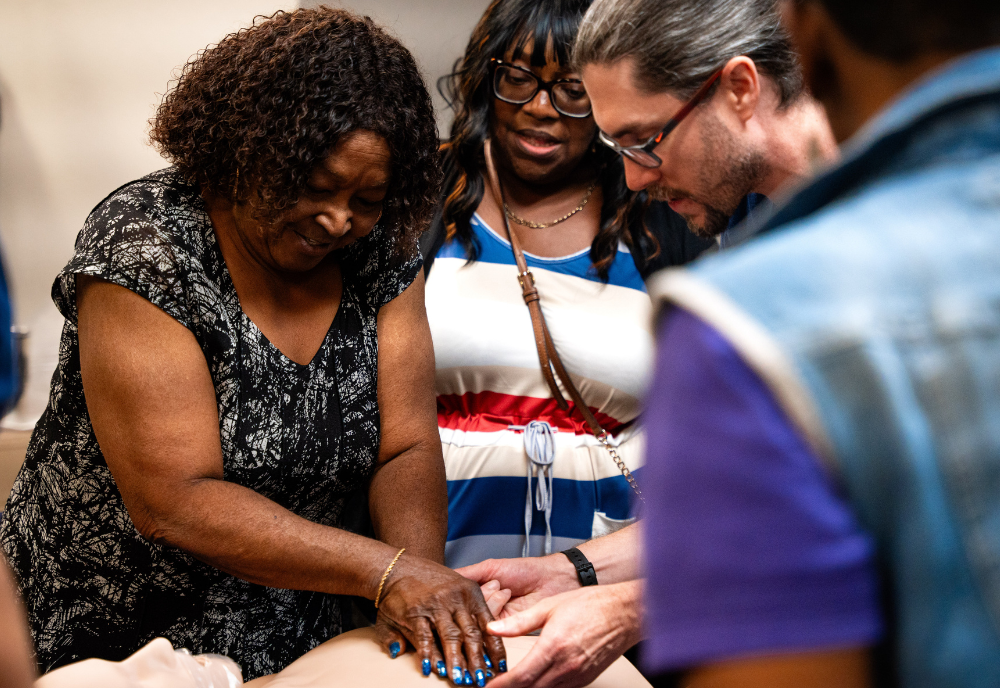 Community members learn CPR