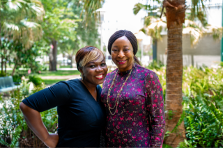 Dr. Oruche and Olejeyes pose together.