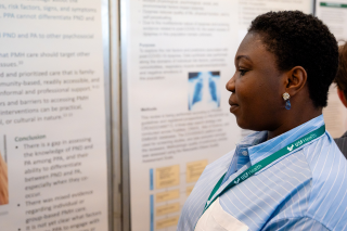 Olajumoke Ojeleye prepares to present her research.