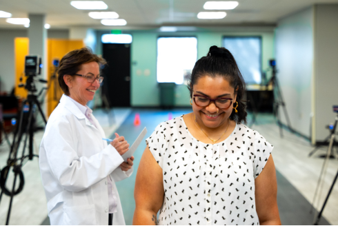 Sandra Morgan evaluates her research study participant's walk.