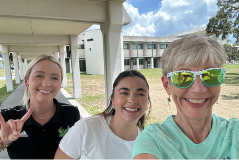 Cheryl Zombraski, Amelia Phillips, and Gillian Torr complete the movement challenge.