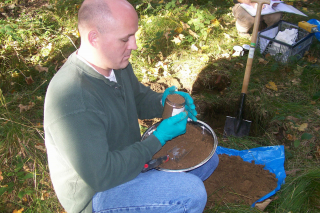 a man digging dirt