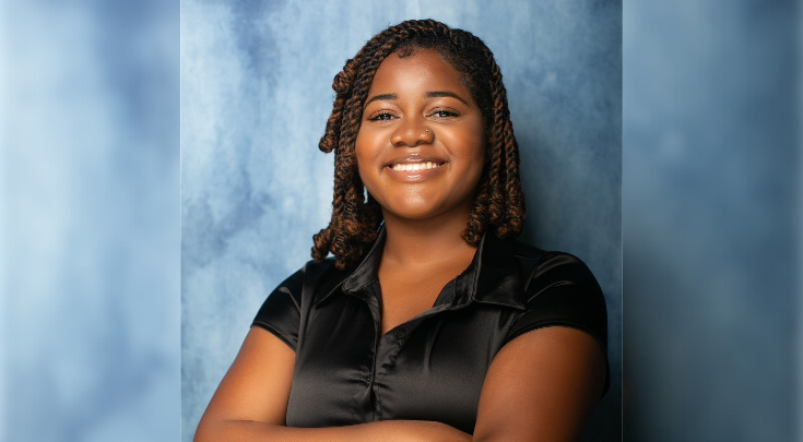 black woman in business casual clothes