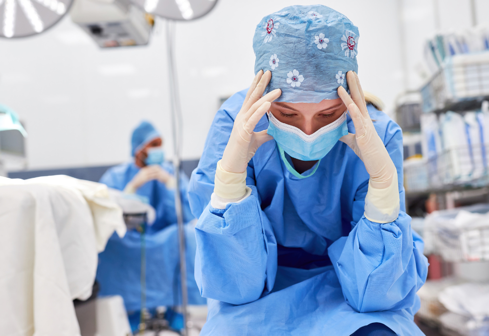 Sad nurse in hospital setting